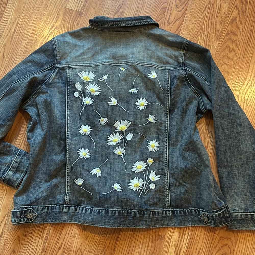 Laurie Felt Distressed Blue Denim Jacket with embroidered daisies